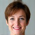 Smiling Sarah M., 48, looking vibrant and healthy