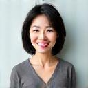 Professional headshot of Dr. Emily Chen, a smiling Asian woman in her 40s in professional attire